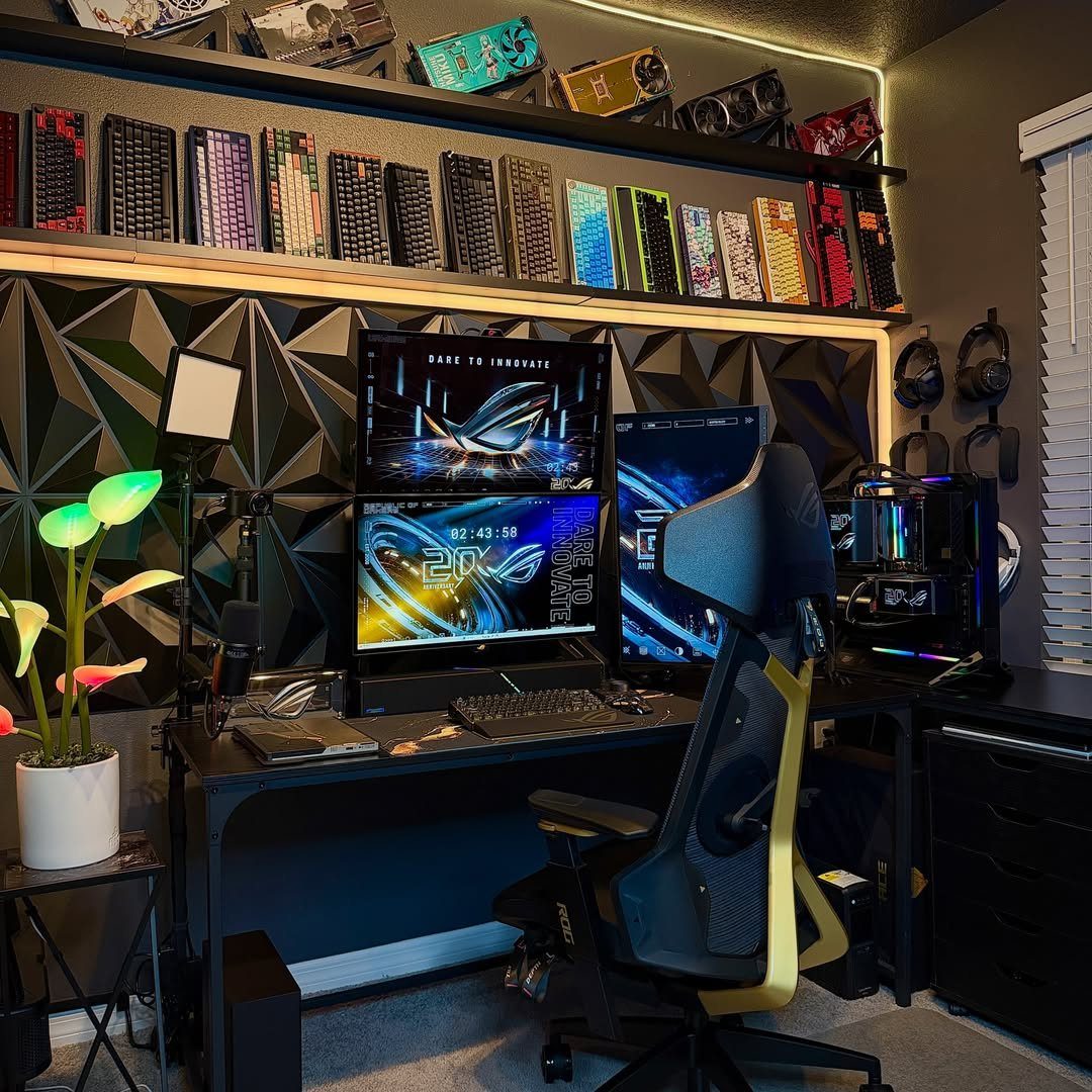 Black gaming setup with three monitors, a gaming chair, and keyboard display shelf.