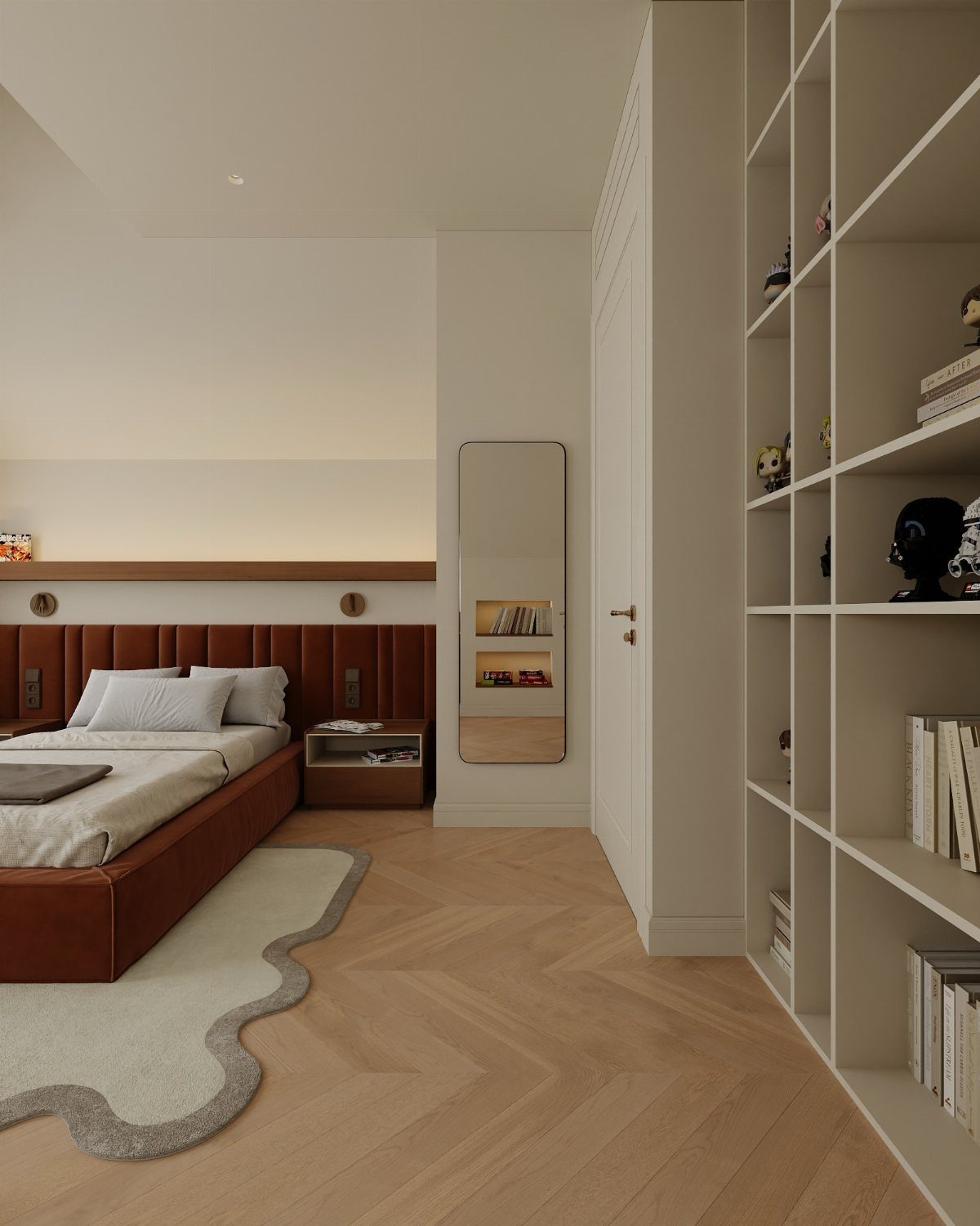 Modern attic bedroom with sloped ceiling, leather bed, and light wood herringbone flooring.