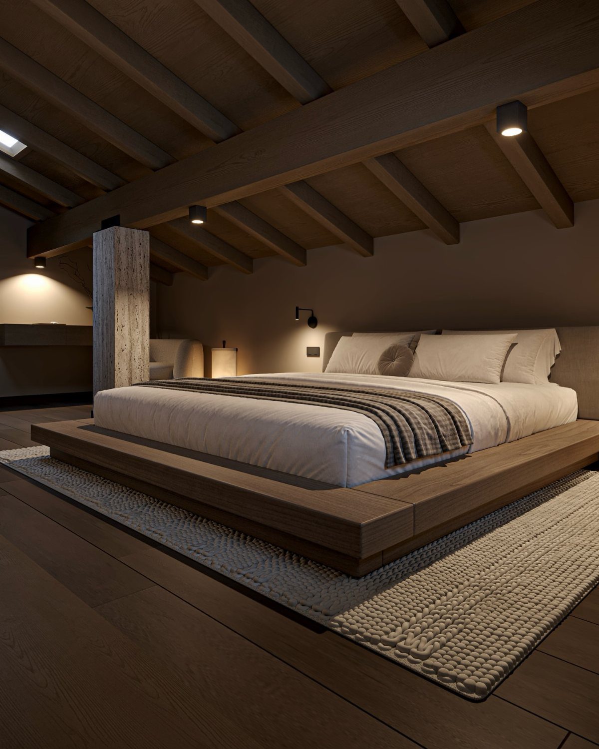 Low wooden platform bed in an attic bedroom with exposed ceiling beams and rug.