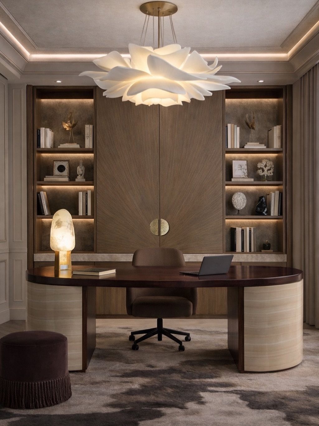 Curved dark wood desk with brown leather chair in a luxury home office