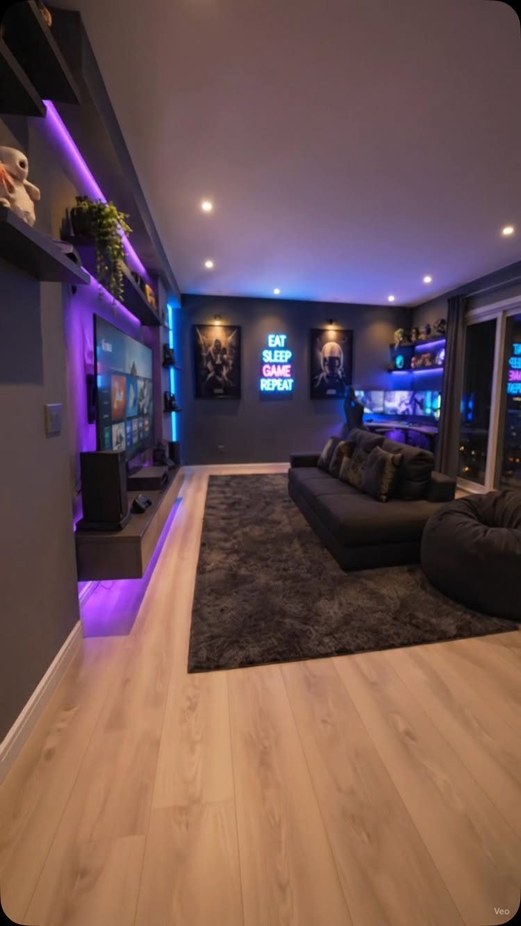 Gaming room with purple and blue LED strips illuminating walls and shelving units