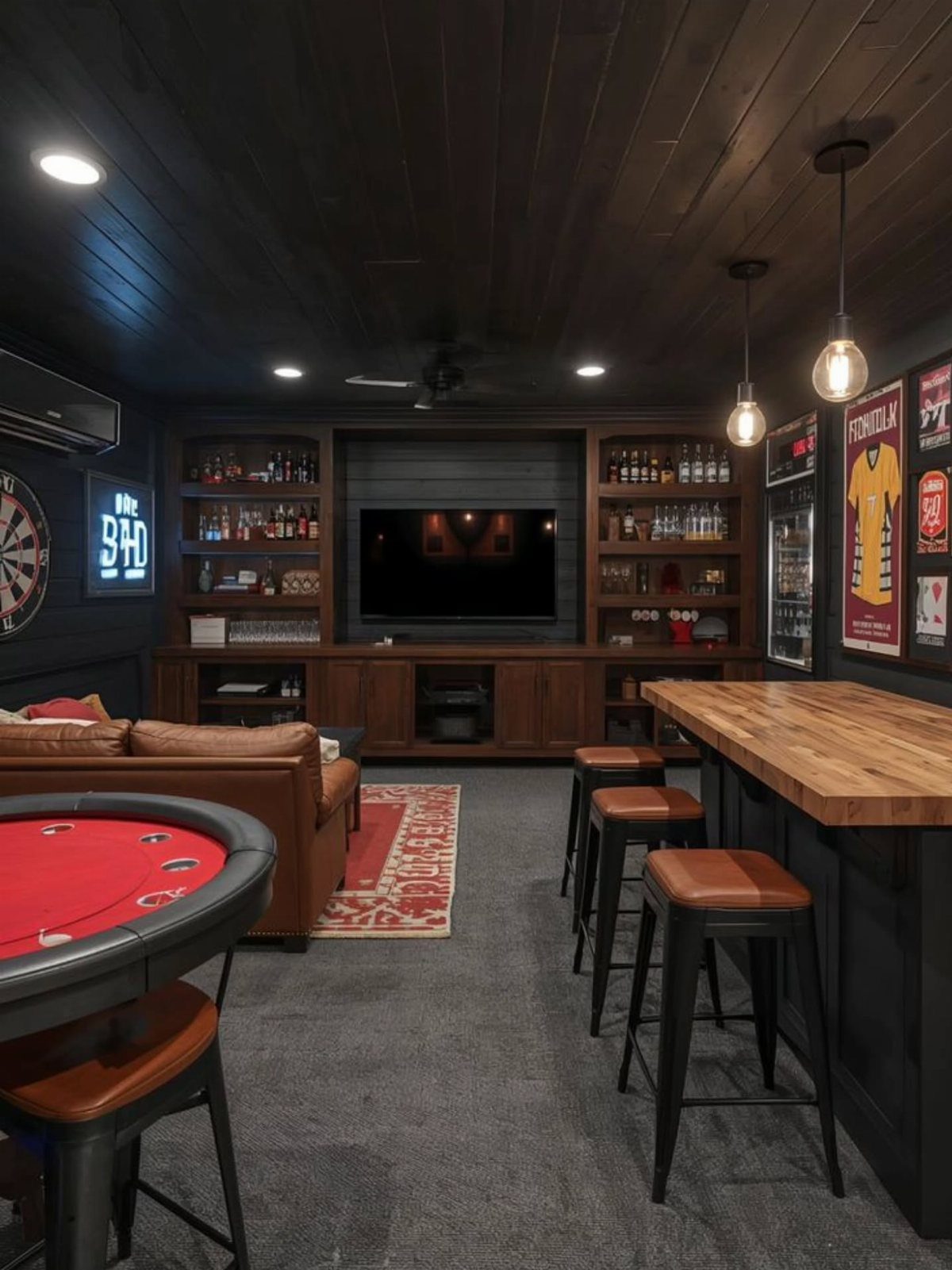 11 Man Cave Must Haves for Your Space 6 Man cave interior with leather sofa, bar stools, television, and a dart board.