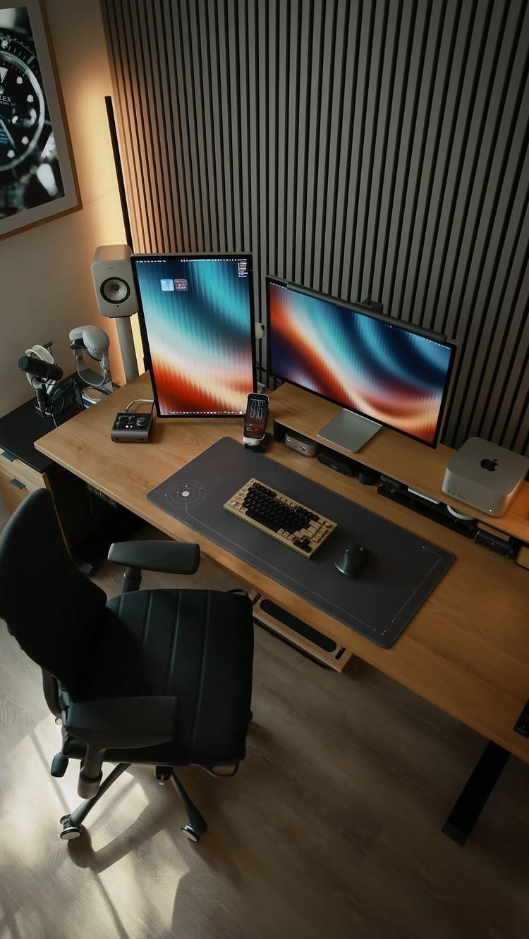 14 Office Decorating Ideas for Work to Refresh Your Space 3 Modern office desk with dual monitors and a grey slatted accent wall.