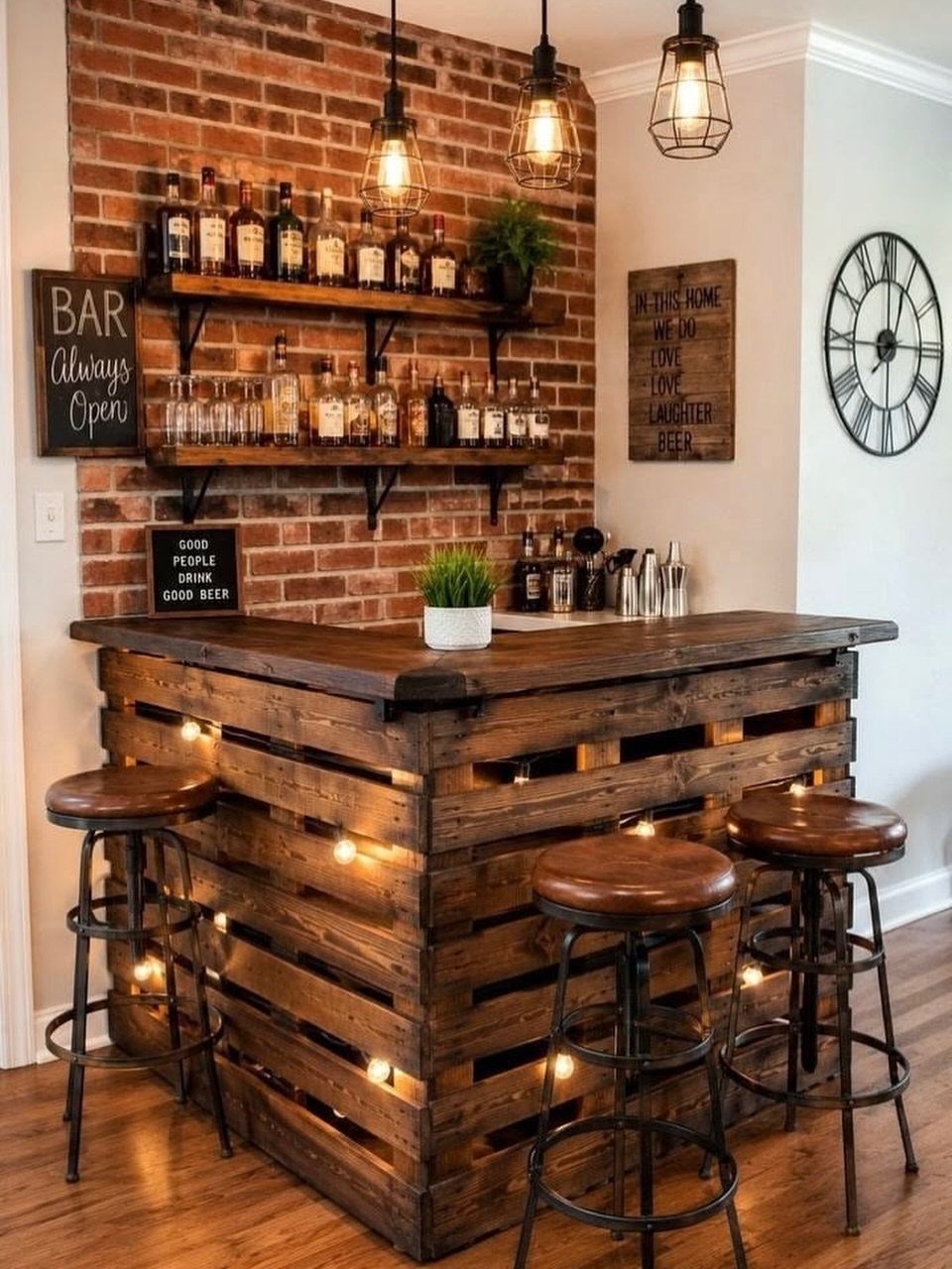 18 Small Bars for Home That Fit Any Space 3 Rustic wooden pallet home bar with bar stools against a red brick wall.