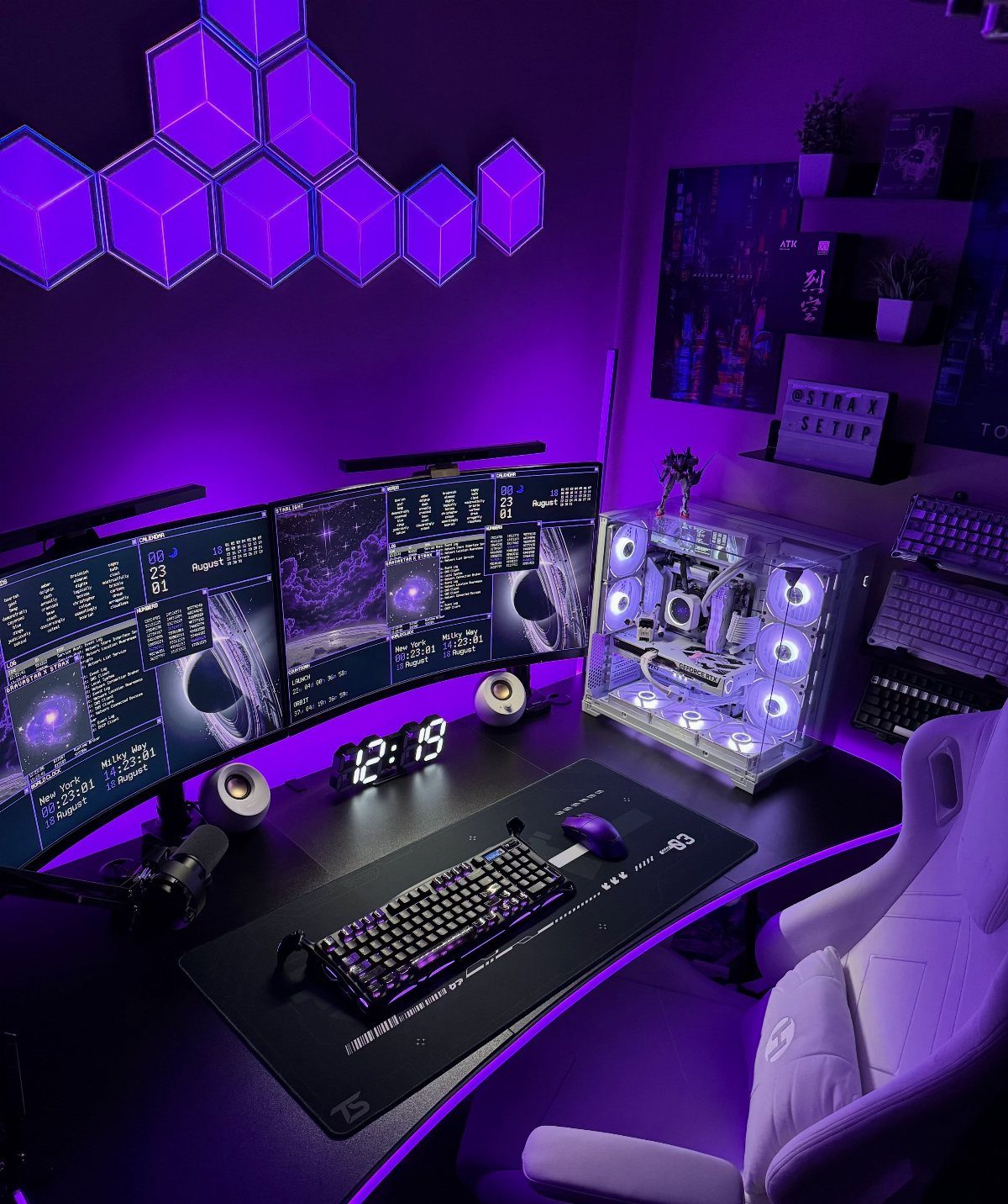 Gaming setup with triple monitors, white chair, and purple hexagonal LED wall panels.
